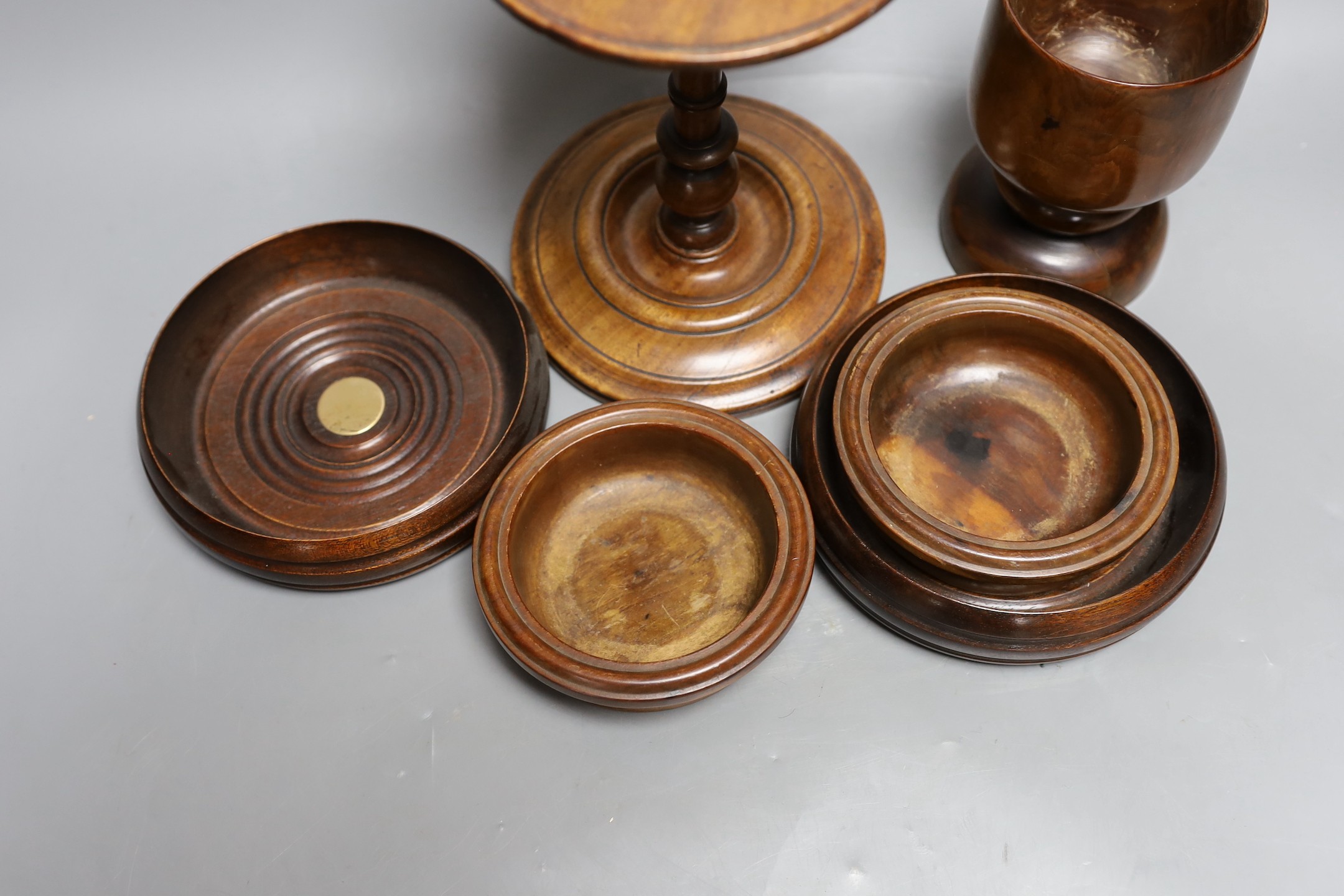 A mahogany adjustable candle stand, coasters etc.